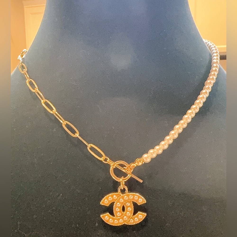 Chanel Charm on Gold Pearl Necklace